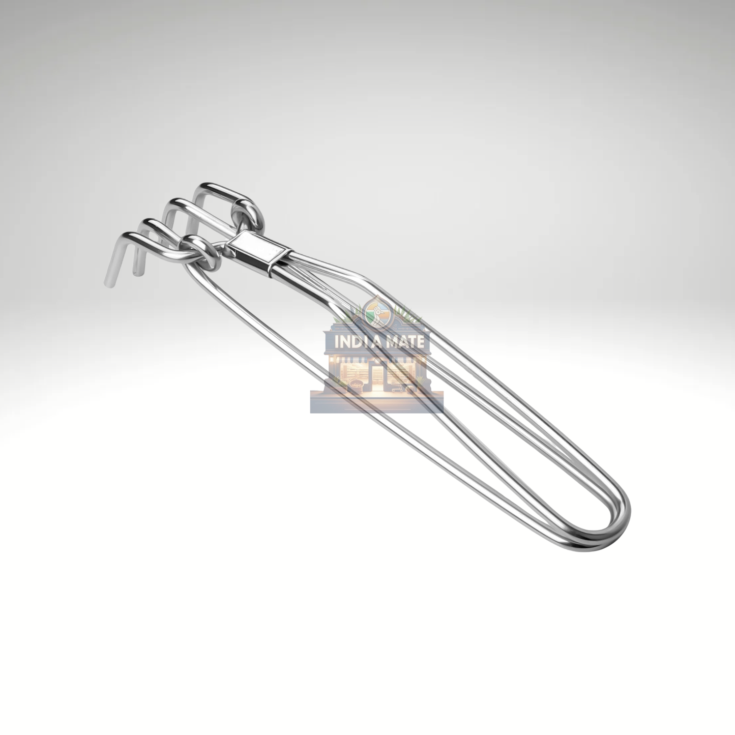 Metallic whisk on a light gray background with 'Indulge' branding.