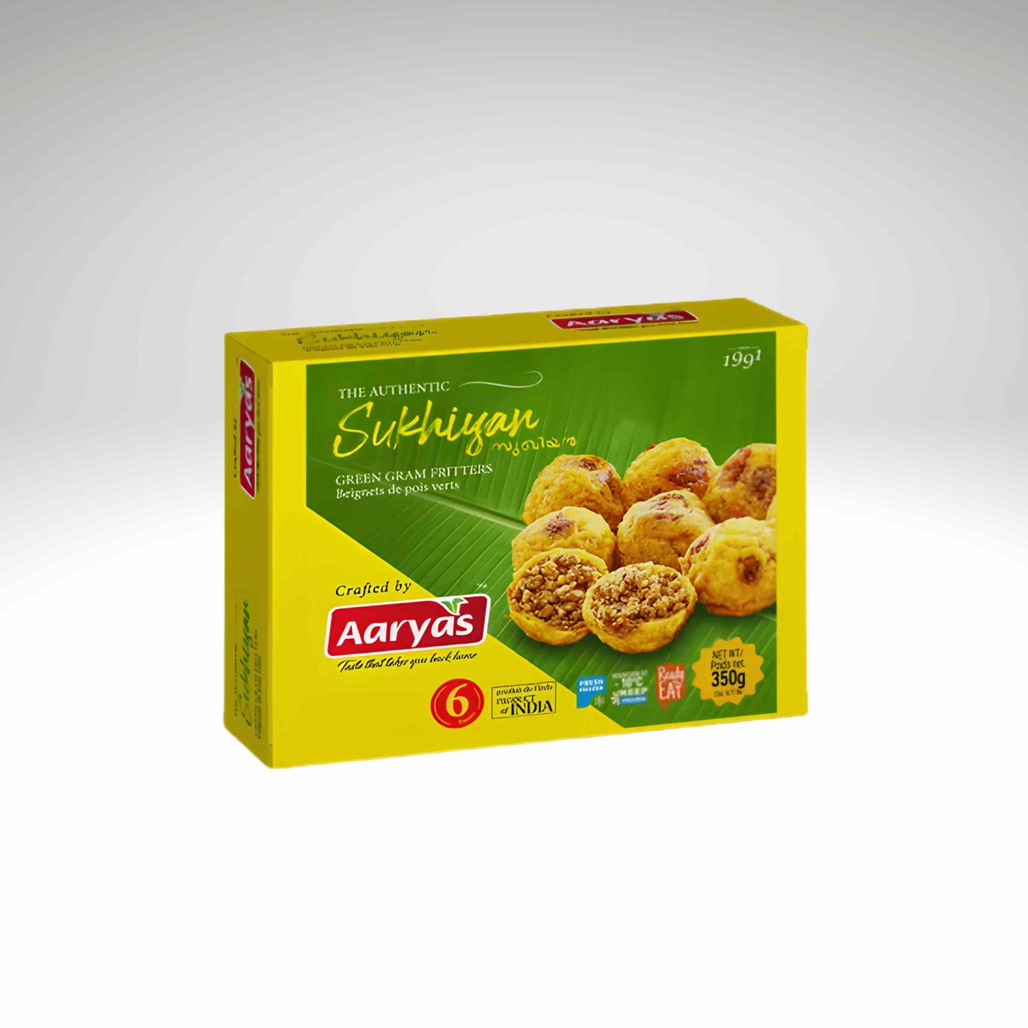 A yellow and green box of Aarya's Authentic Sukhian, featuring an illustration of the golden-brown snack on a green leaf background.