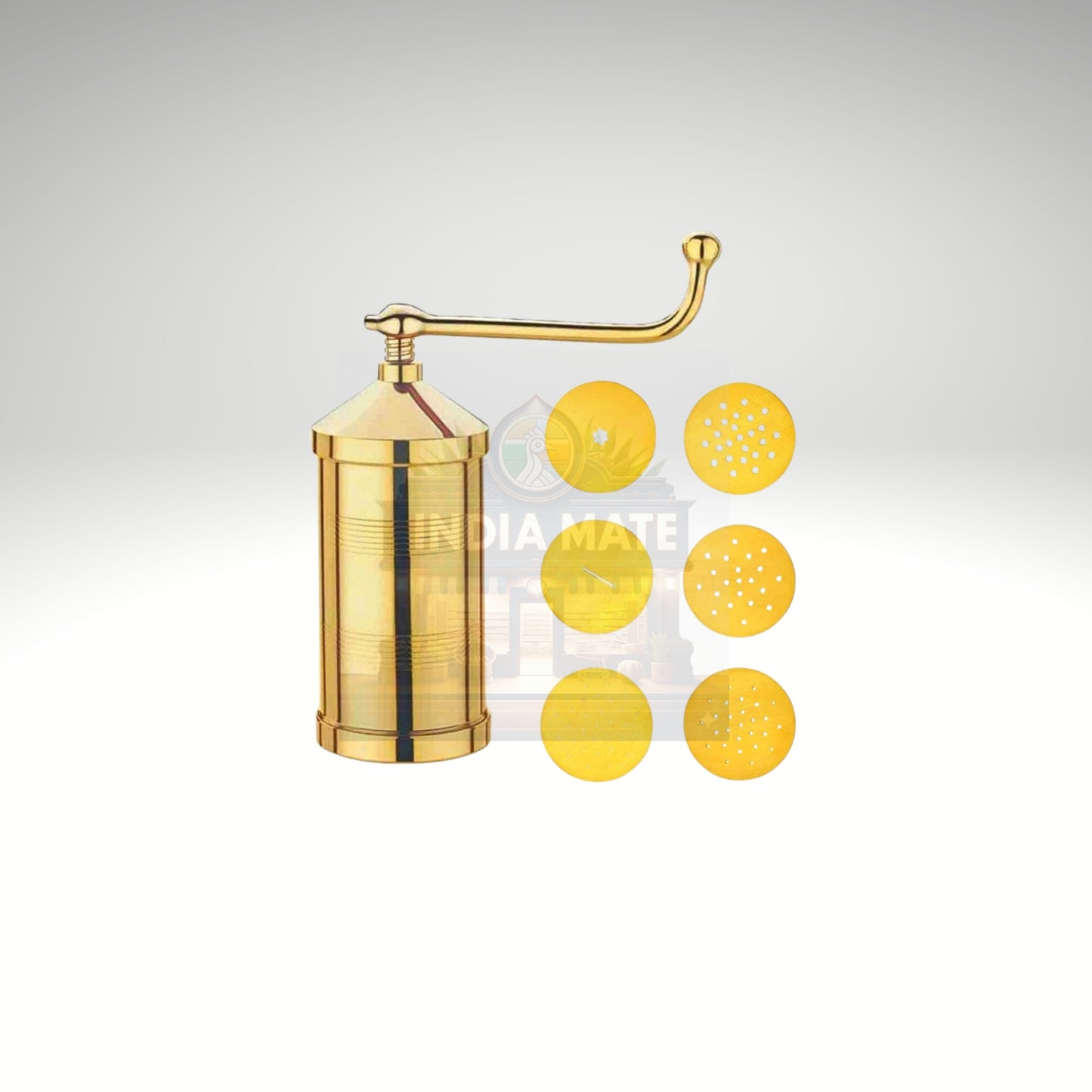 Gold-colored manual juicer with yellow silicone filters on a light gray background