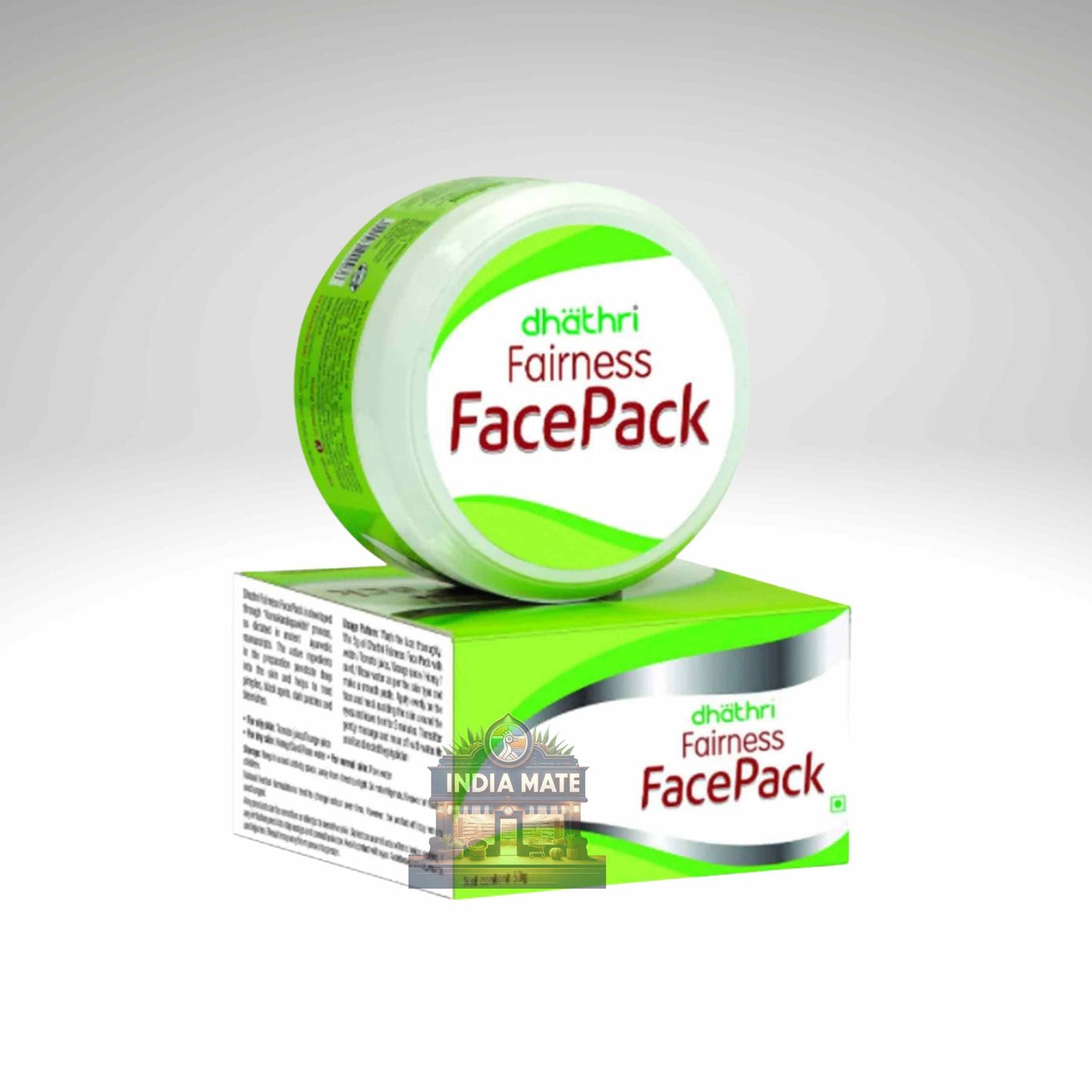 A round jar of dhathri Fairness FacePack with a matching green and white box, displayed on a light gray gradient background.