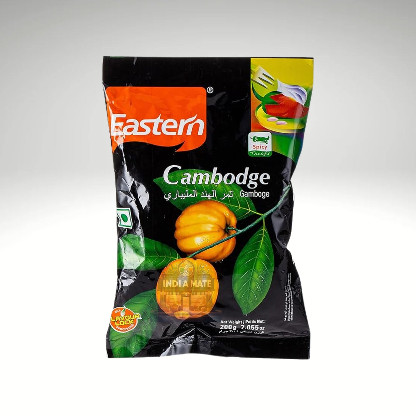 Black package of Eastern Cambodge with orange fruit and green leaves on a white background
