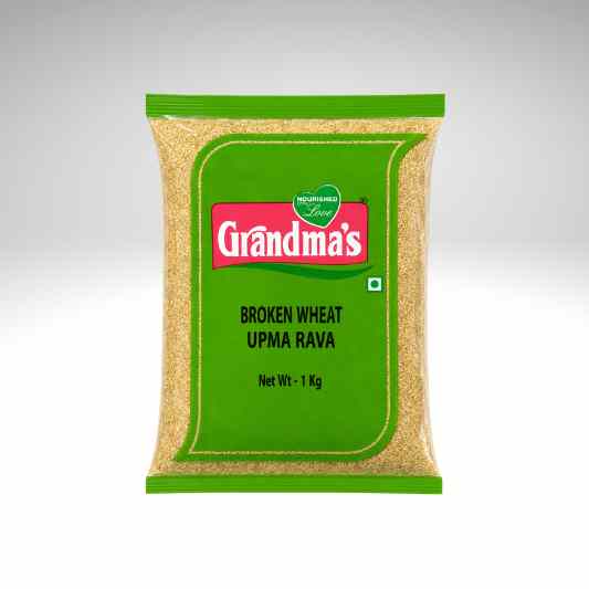 A 1 kg bag of Grandma's Broken Wheat Upma Rava, featuring a green and red label with the brand name 'Grandma's' on a light gray gradient background.