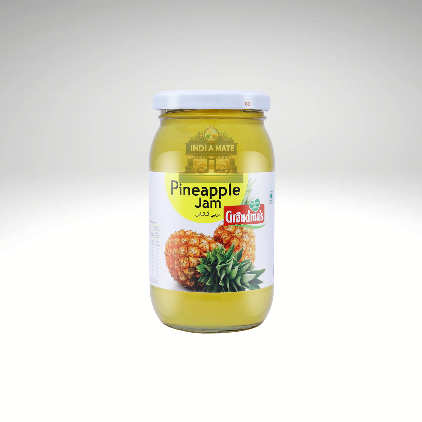 Glass jar of Grandma’s Pineapple Jam – golden yellow tropical fruit spread made with ripe pineapples.