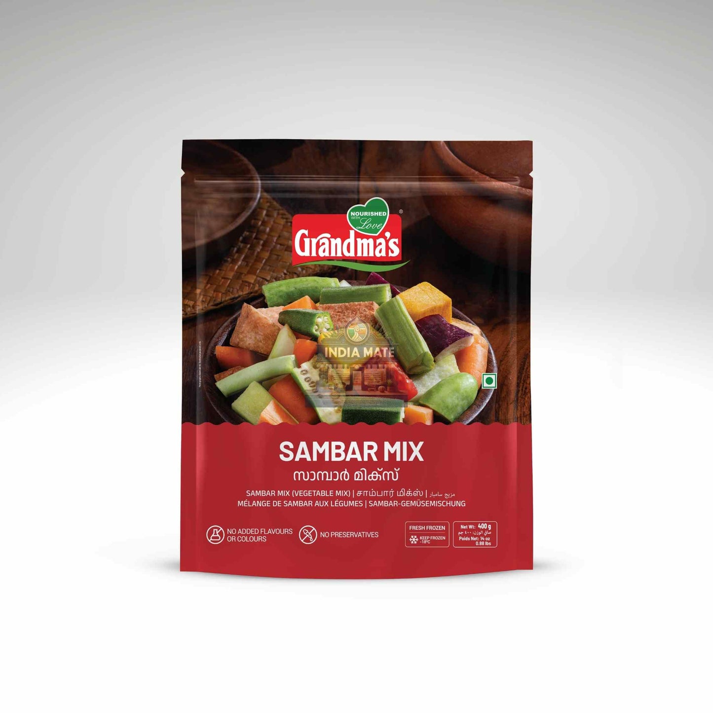 Packaging of Grandma's Sambar Mix with a bowl of sambar on a white background