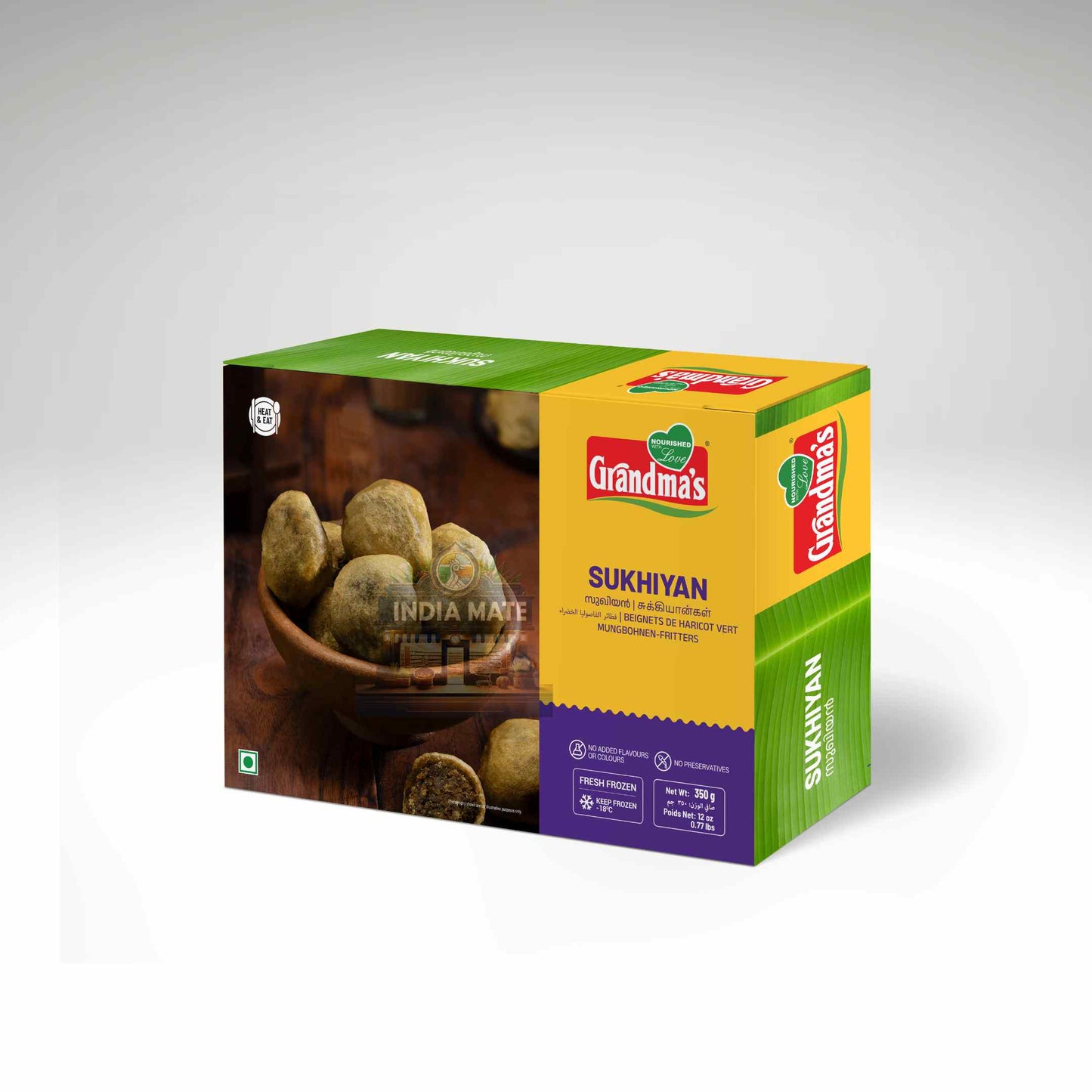 Box of Grandma's Sukhiyan with a wooden bowl of green spherical items on a white background
