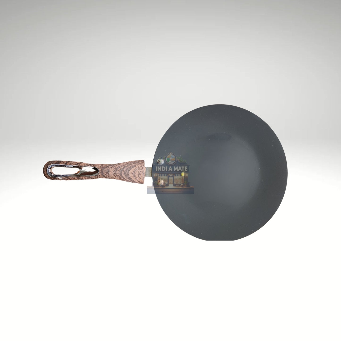 Black frying pan with wooden handle on a white background