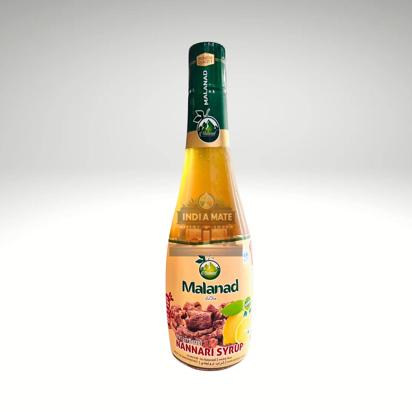 Bottle of Malanad Nannari Syrup on a white background