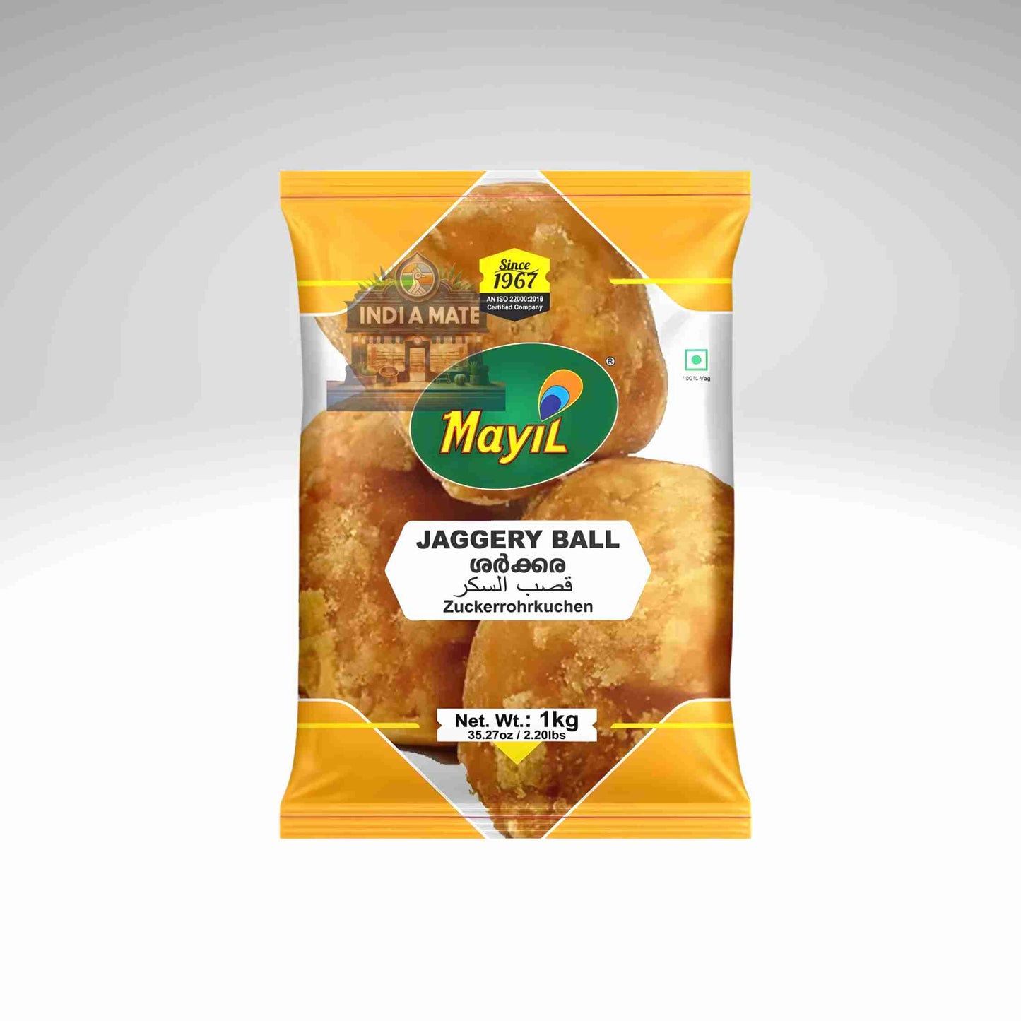 Mayil brand jaggery ball packaging on a gray background.