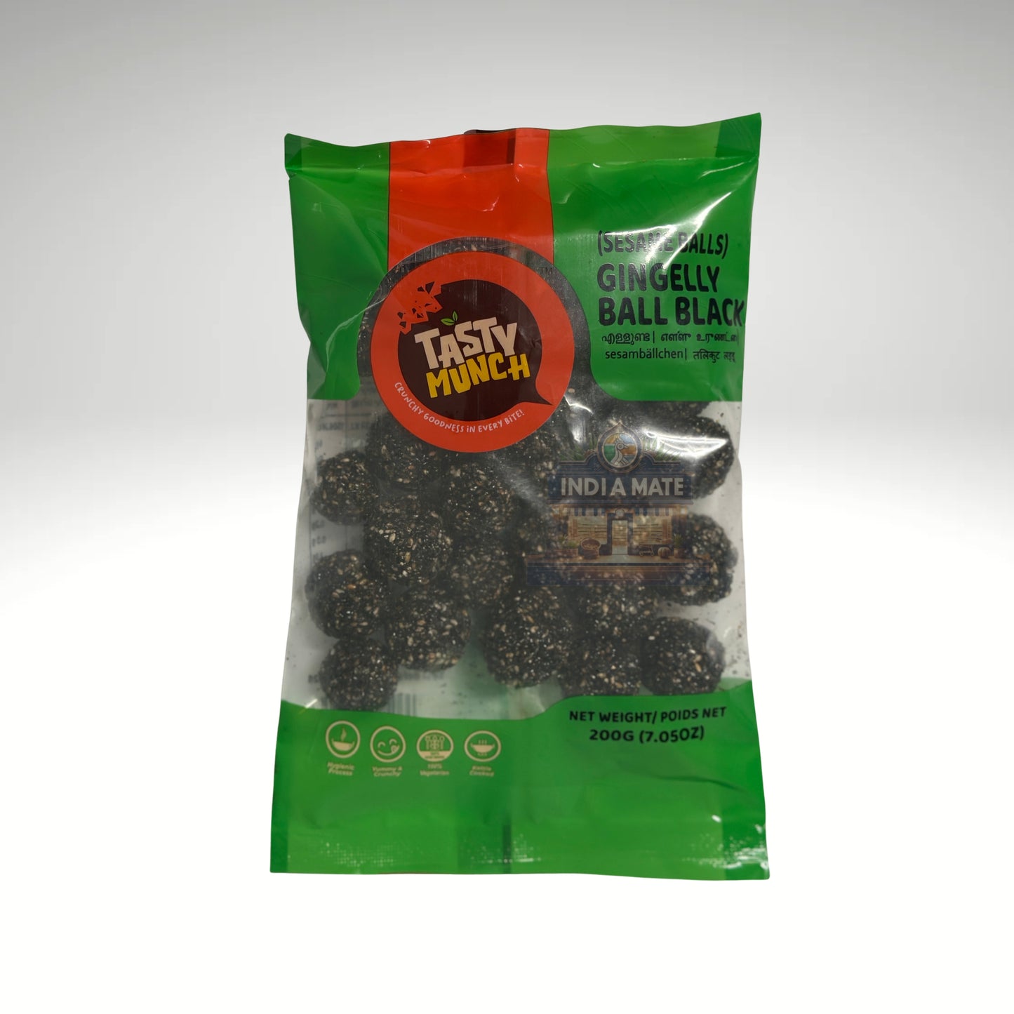 Green package of Tasty Munch Gingelly Ball Black on a white background