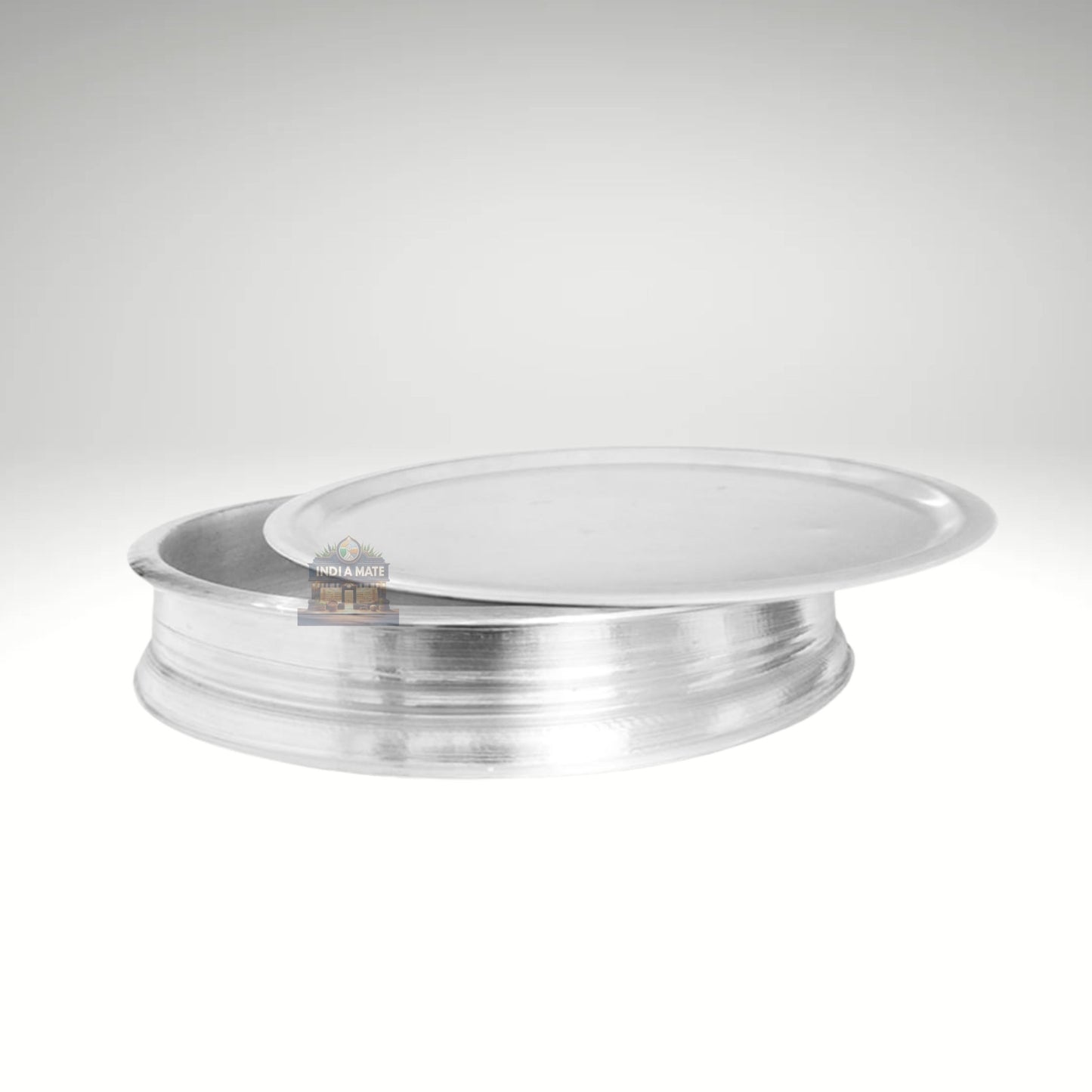 Metallic circular object on a white background