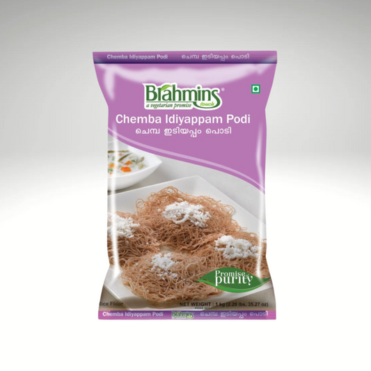 Image of a package of Brahmins Chemba Idiyappam Podi, showcasing a colorful design with the product name prominently displayed. The package features an illustration of soft, steamed idiyappam served with curry, set against a warm, inviting background.