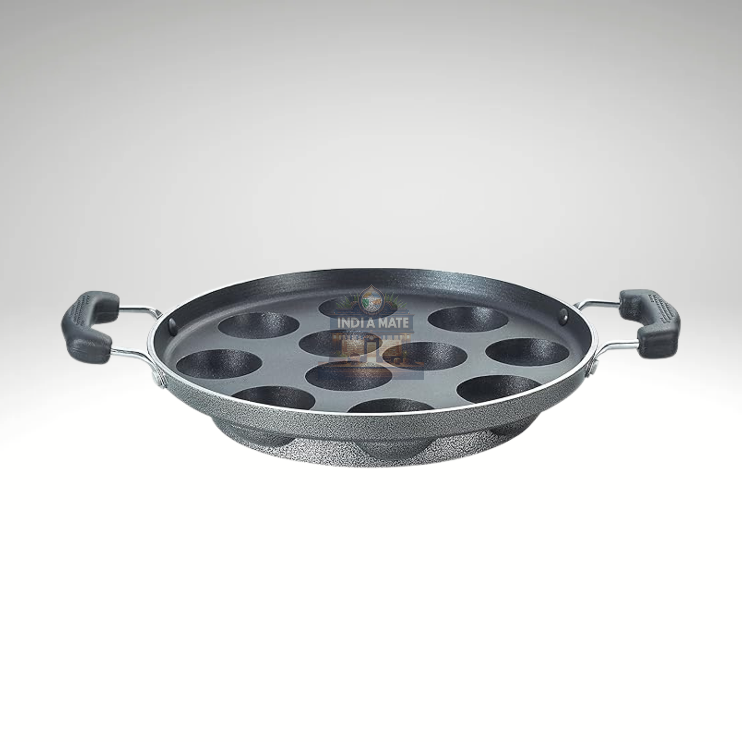 Black metal pan with multiple holes on a white background