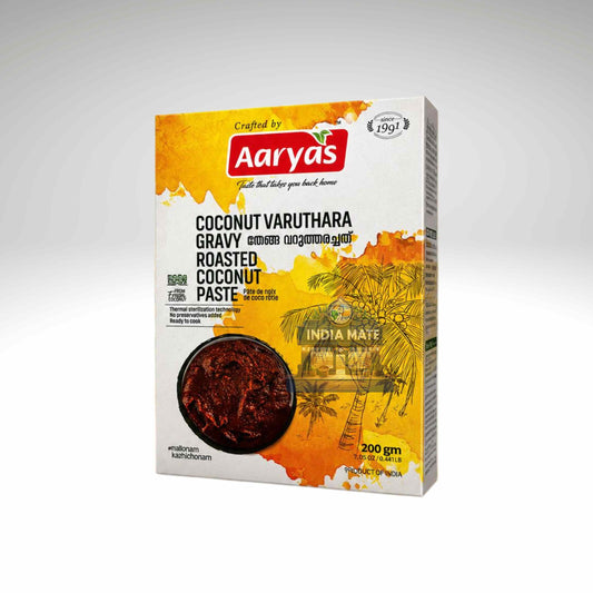 A 200g box of Aarya's Coconut Varuthara Gravy Roasted Coconut Paste, featuring a white and yellow-orange label with a red brand logo and a photo of the dark brown paste inside.