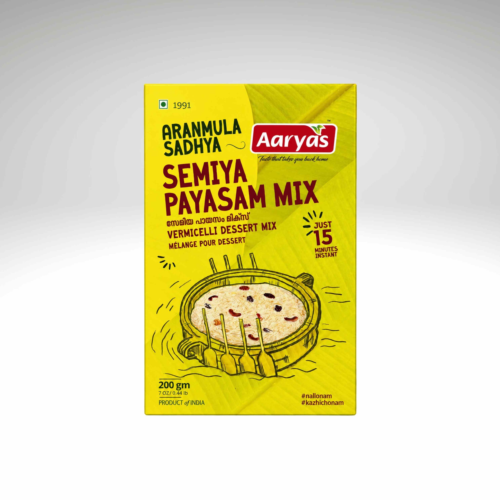 A yellow box of Aarya Sadhya Semiya Payasam Mix (vermicelli dessert mix) by the brand Aarya, shown against a neutral gray gradient background.