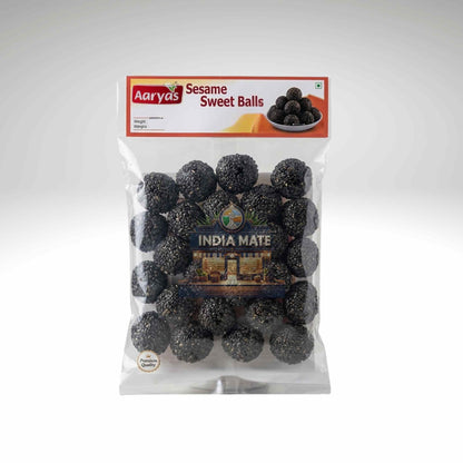 Packaged sesame sweet balls with Aaryas branding on a white background