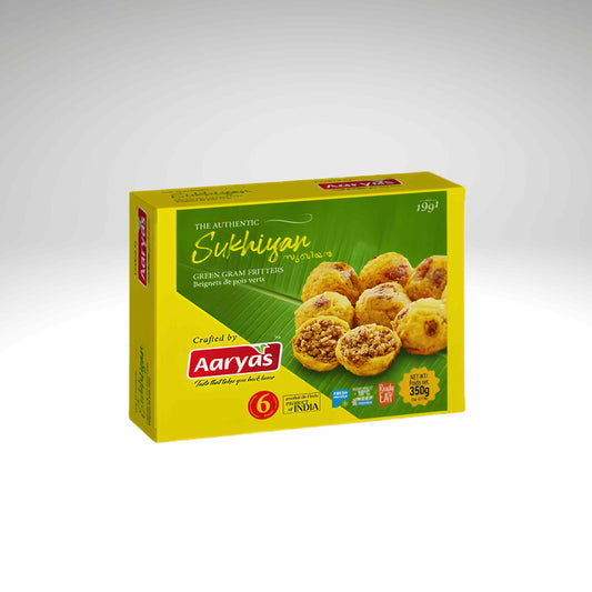 A yellow and green box of Aarya's Authentic Sukhian, featuring an illustration of the golden-brown snack on a green leaf background.