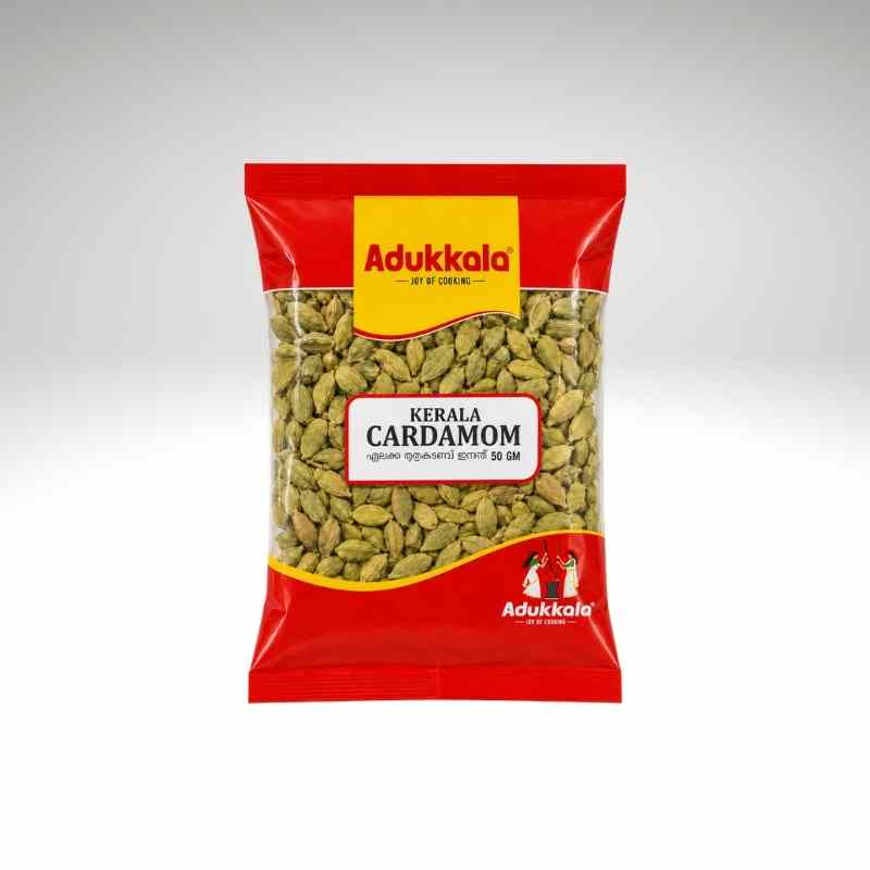 A bag of Adukkalo Kerala Cardamom whole green cardamom, packaged in a red and yellow bag with a clear window showing the green cardamom inside.