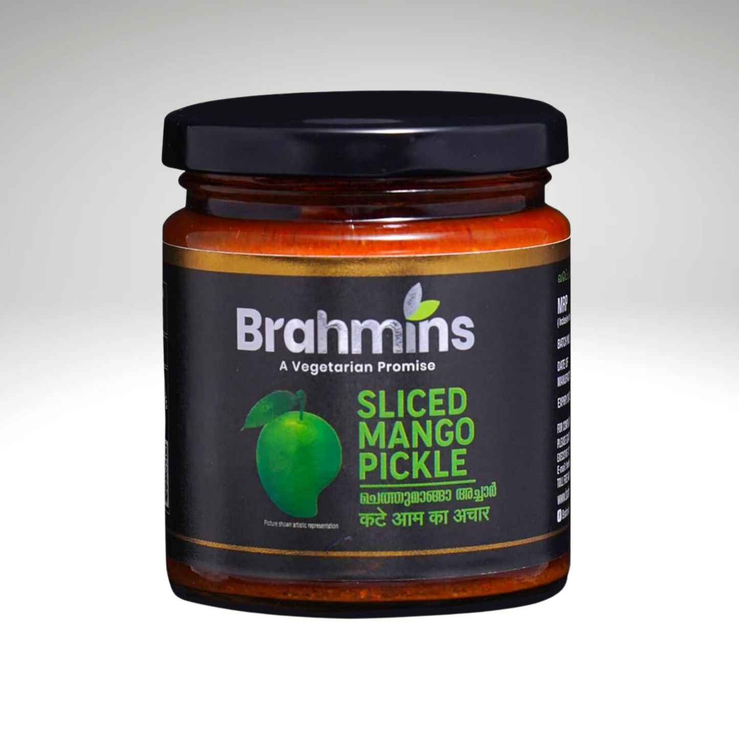 A jar of Brahmins Sliced Mango Pickle, showcasing vibrant mango slices mixed with spices in a rich, glossy oil, emphasizing its bold and tangy flavour.