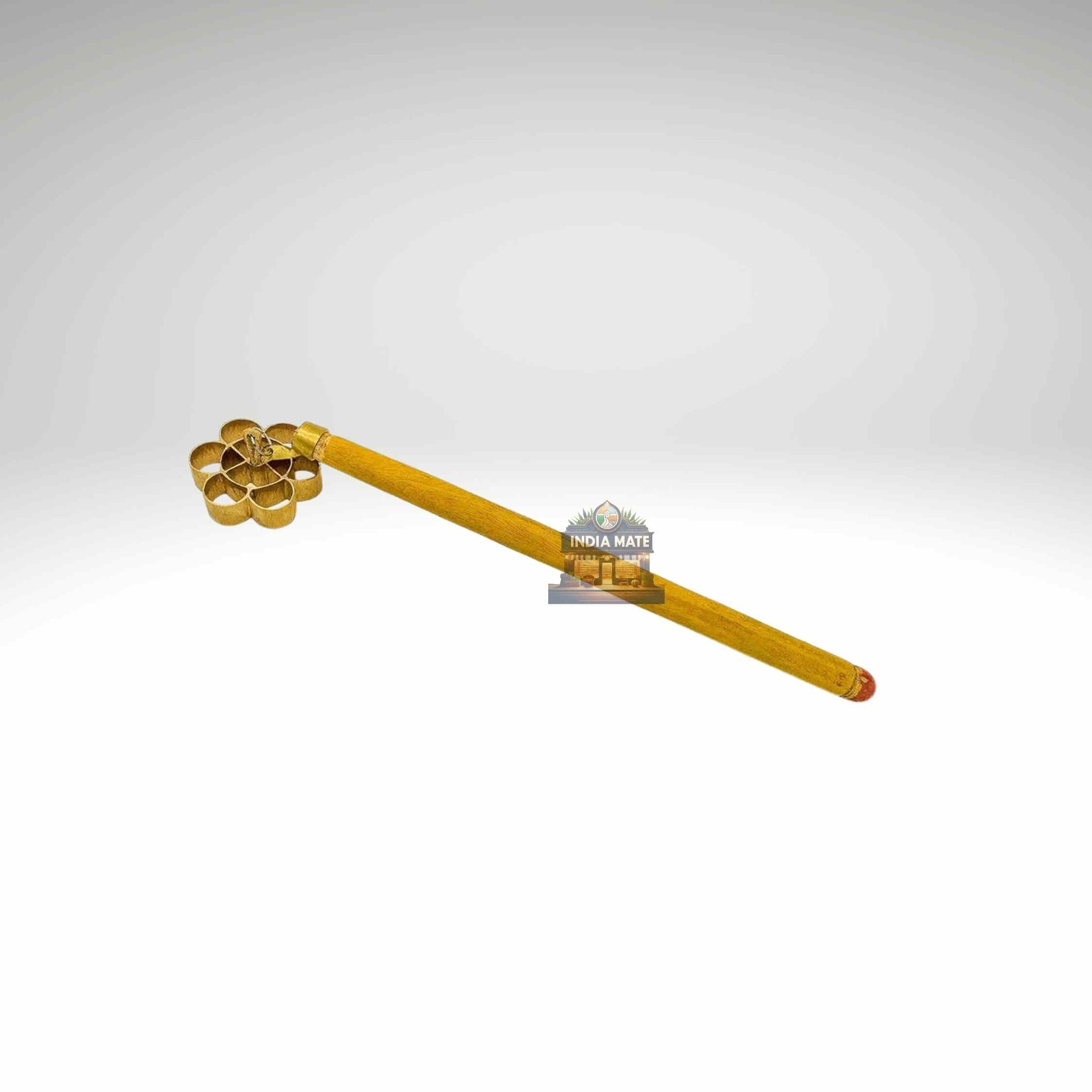 Gold-colored tool with a handle on a white background