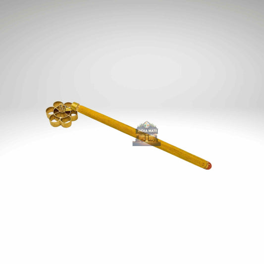 Gold-colored tool with a handle on a white background