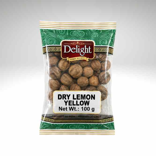 A 100g bag of Delight brand Dry Lemon Yellow nuts, shown in its green and gold patterned packaging with a clear window displaying the brown nuts inside, set against a neutral gray background.