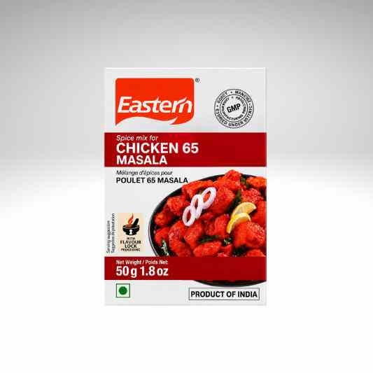 A 50g box of Eastern Chicken 65 Masala spice mix, featuring a white and red packaging design with a photo of cooked chicken in red sauce.