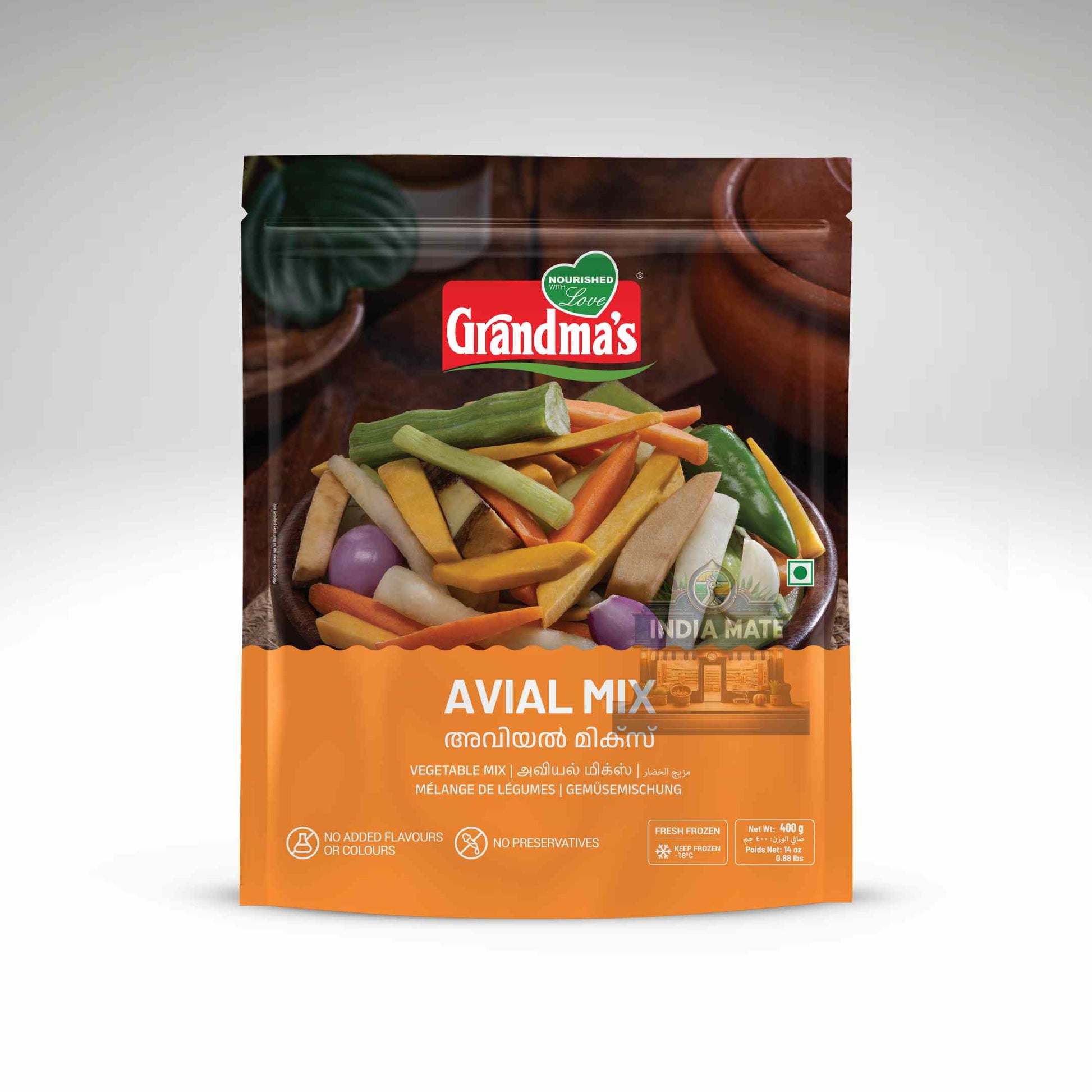 Packaging of Grandma's Avial Mix with colorful vegetables on an orange background