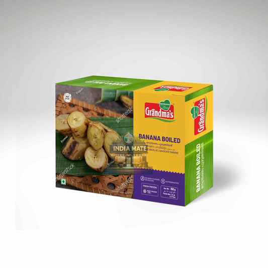 A box of Grandma's Banana Boiled India Mate snack, featuring a green and yellow packaging design with a photo of sliced banana on the front, set against a neutral gray background.