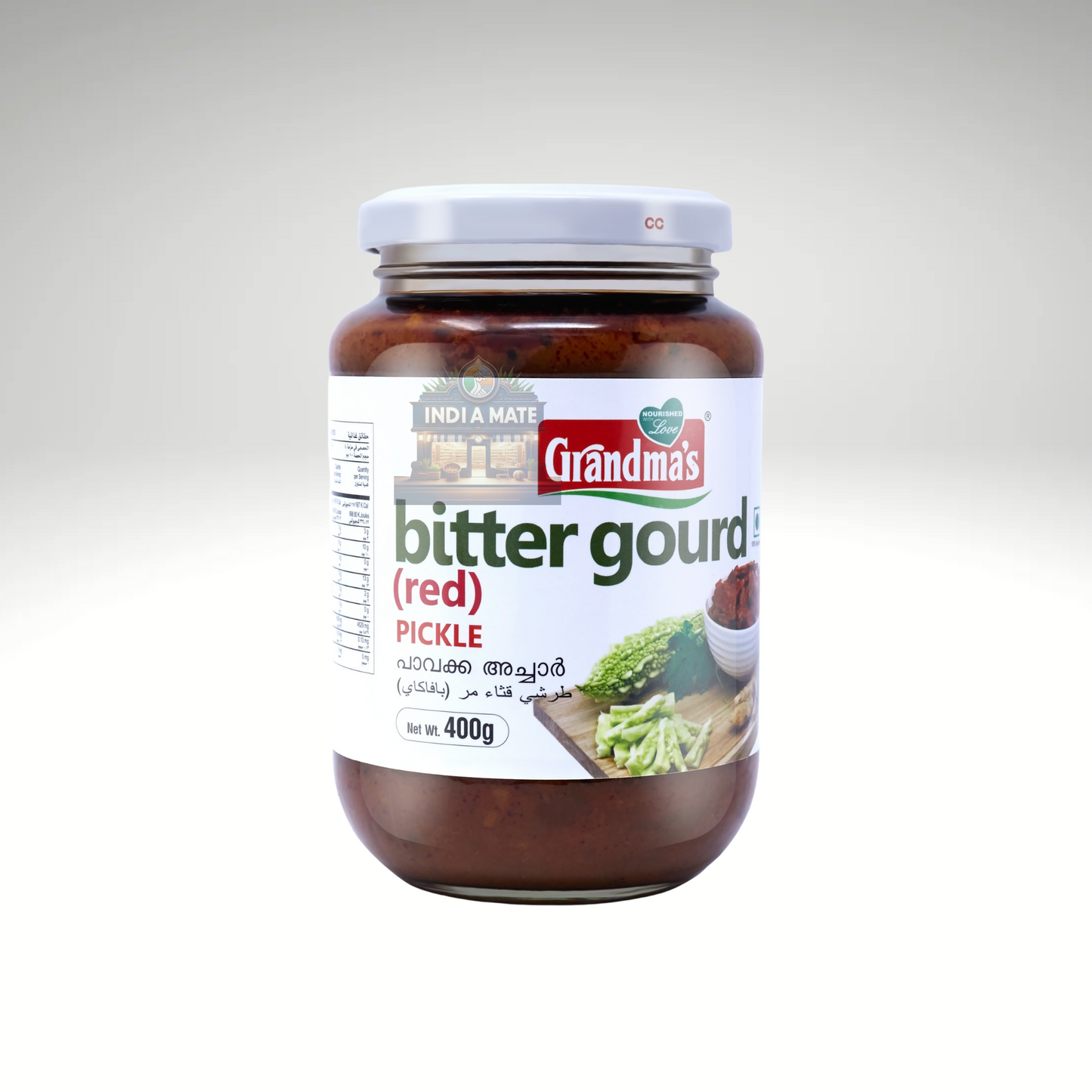 Jar of Grandma’s Bitter gourd Pickle – Kerala-style Pavakka Achar made with sliced bitter gourd, spices, and garlic.