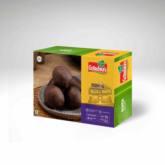 Box of Grandma's Bonda India Mate with a bowl of boulders on a white background