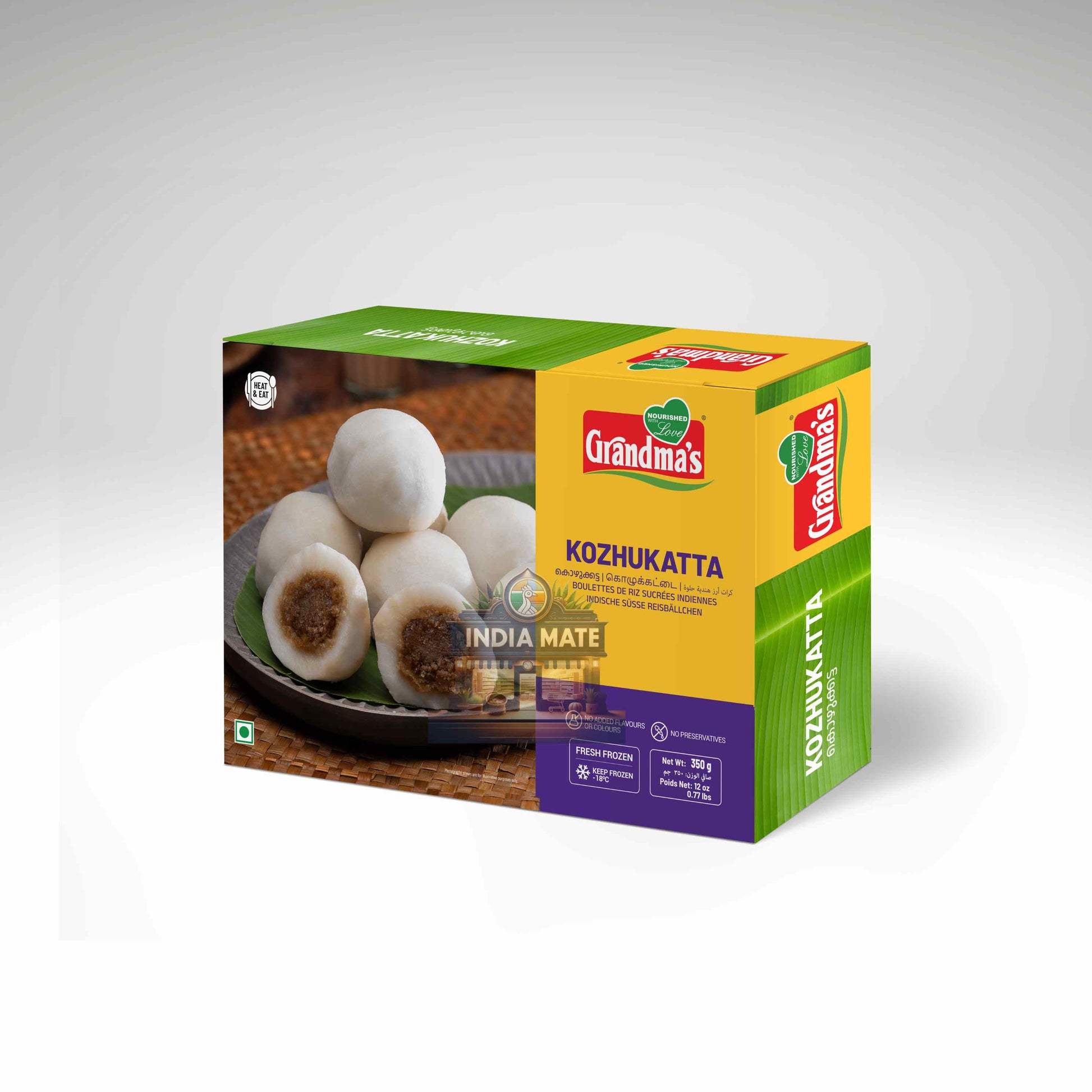 A box of Grandma's Közhukatta India Mate, featuring a green and yellow packaging design with a photo of white steamed dumplings on the front, set against a neutral gray background.