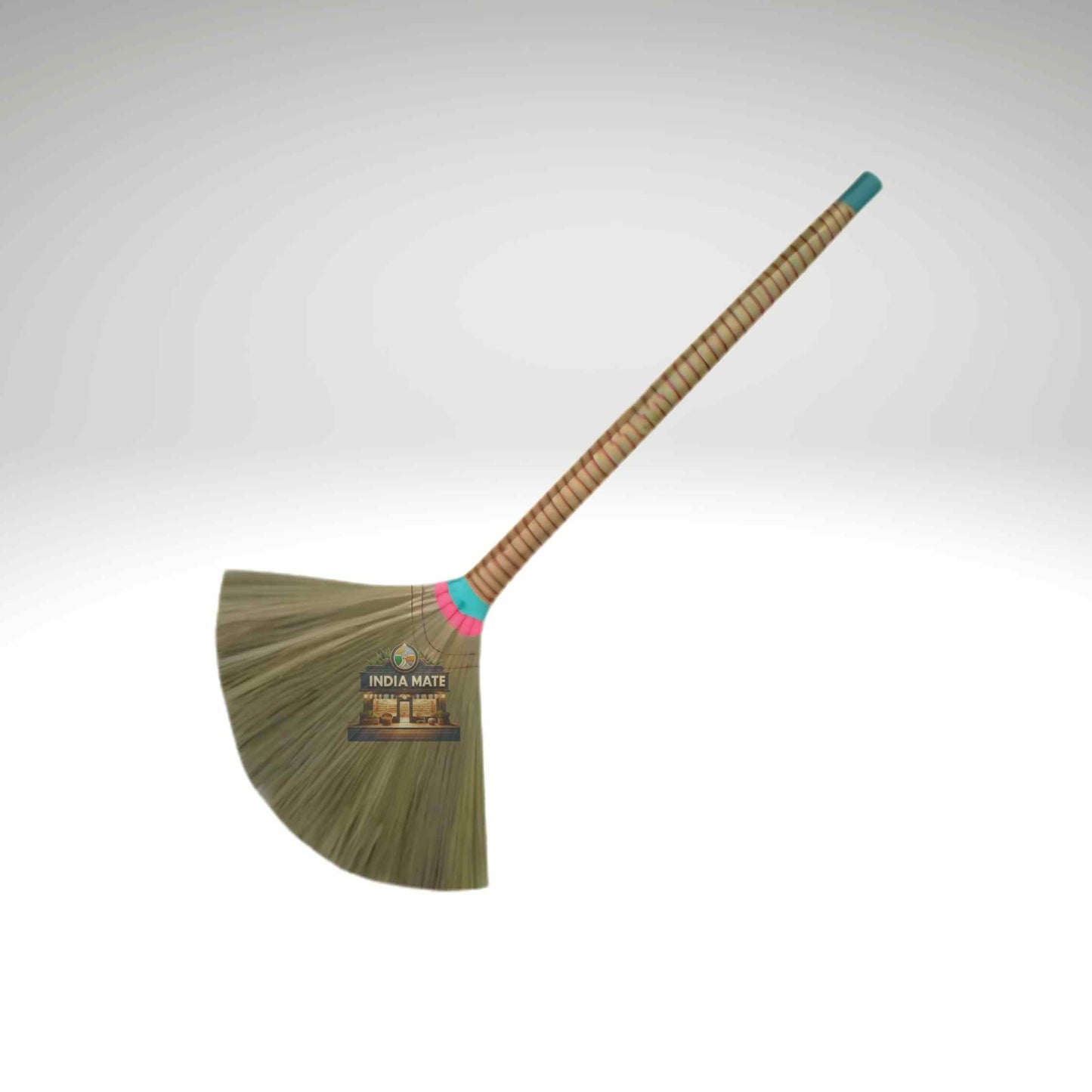 Broom with a wooden handle and green bristles on a white background