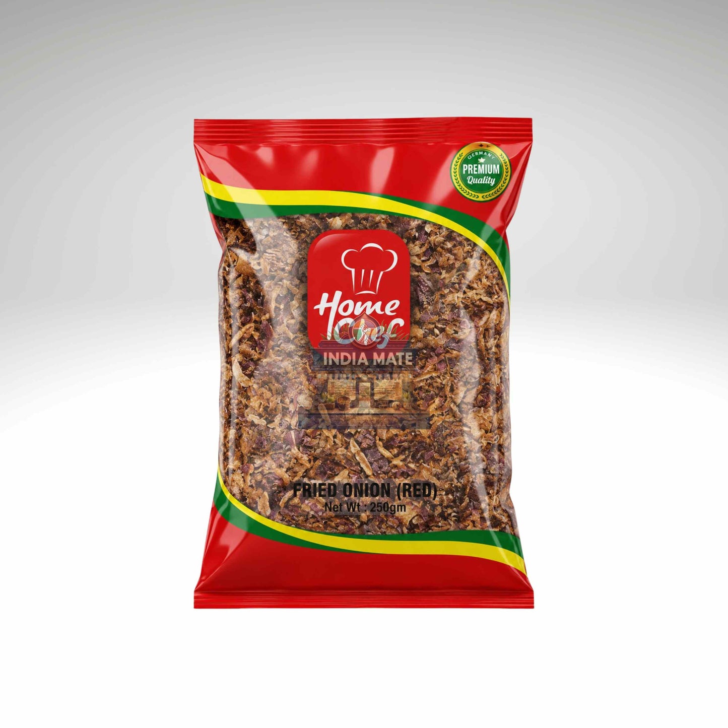 A 100g bag of Home Chef India Mate Fried Onion (Red) snack, featuring a red packaging design with green and yellow accents and a clear window showing the fried onion pieces inside.