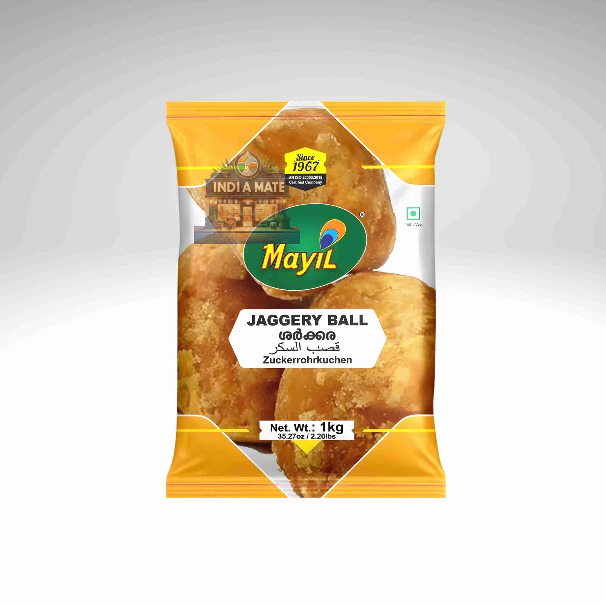Mayil brand jaggery ball packaging on a gray background.
