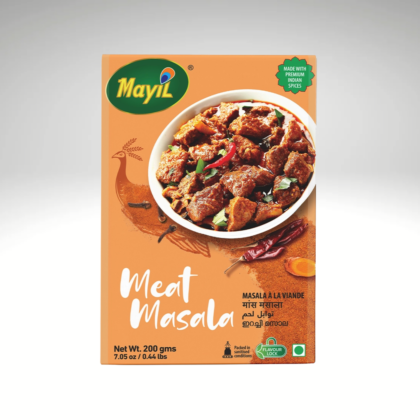 Mayil Meat Masala spice blend packaging with vibrant traditional Indian design, featuring bold brown and green colour, used for enhancing the flavour of meat dishes.