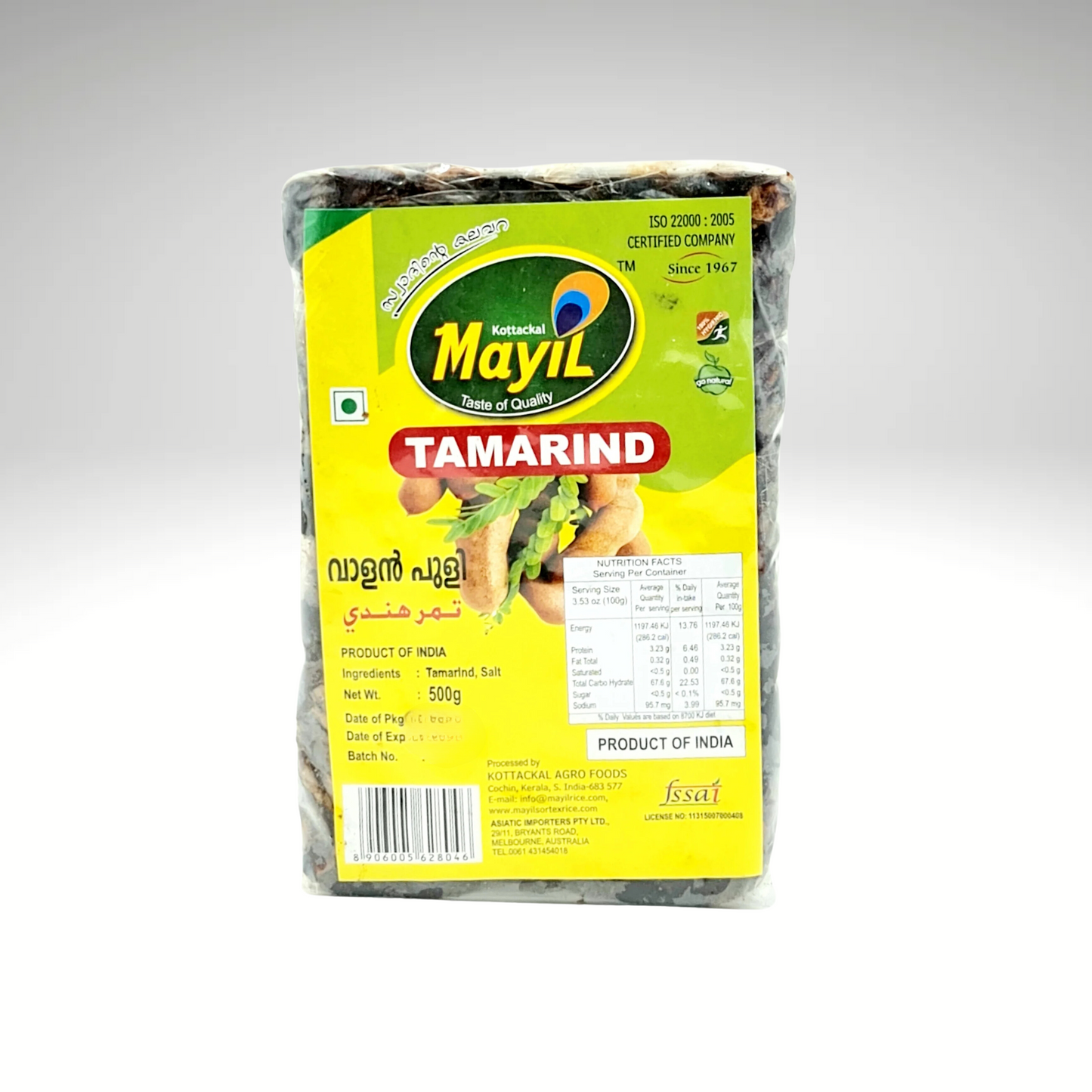 Mayil Tamarind, a pack of high-quality tamarinds, used as a tangy flavouring agent in South Indian cuisine. The product is presented in a green and yellow packaging, featuring the Mayil brand logo and detailed information about its uses, ideal for enhancing curries, chutneys, and other dishes.