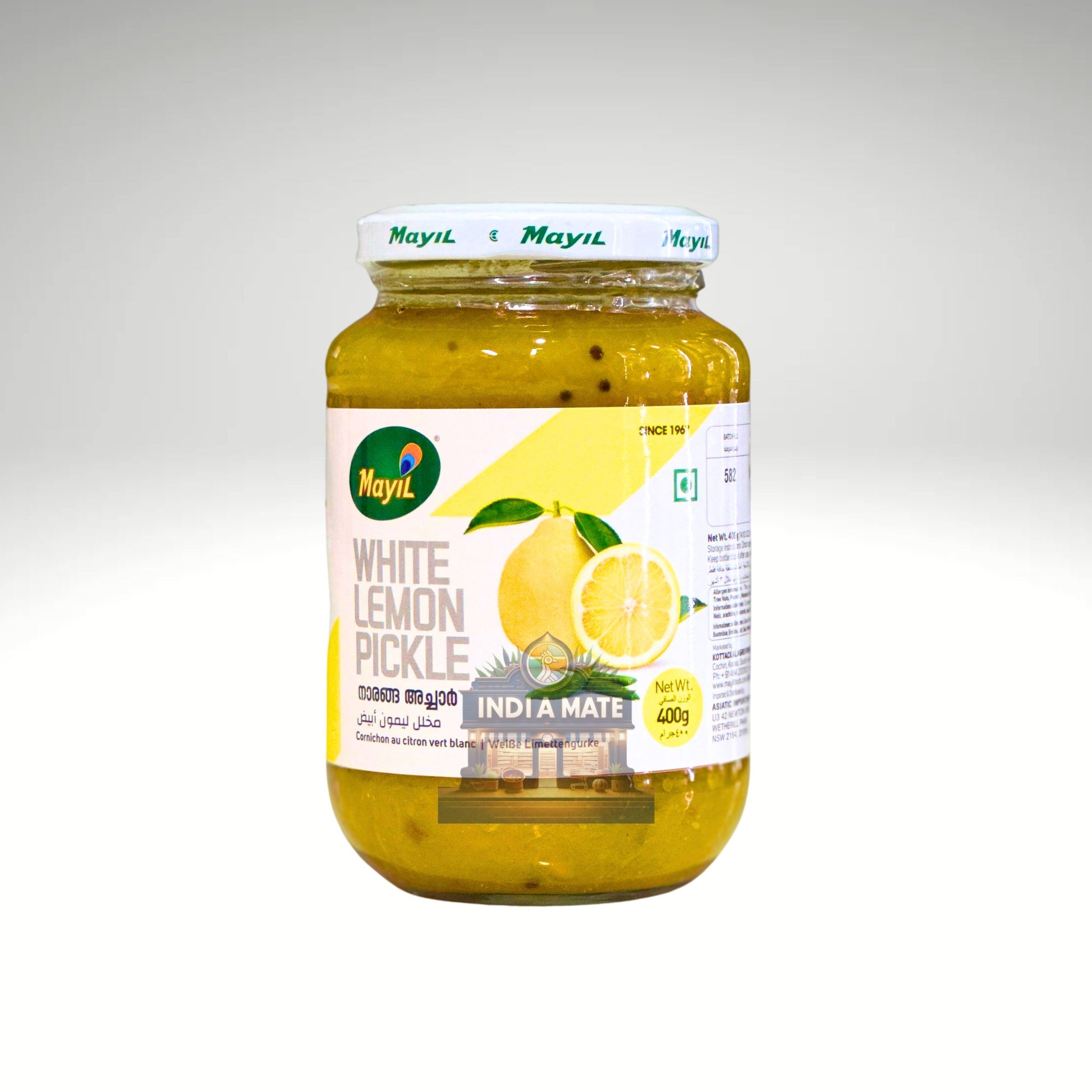 Mayil White Lime Pickle jar featuring a vibrant label with traditional Indian design elements, containing tangy white lime pickle made with authentic spices.