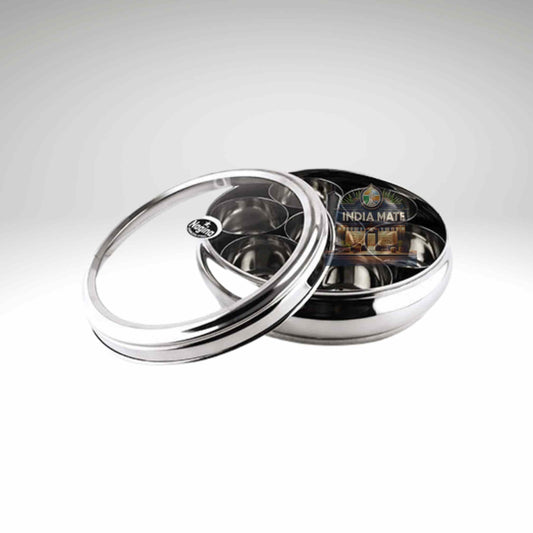 Stainless steel container with a lid on a white background