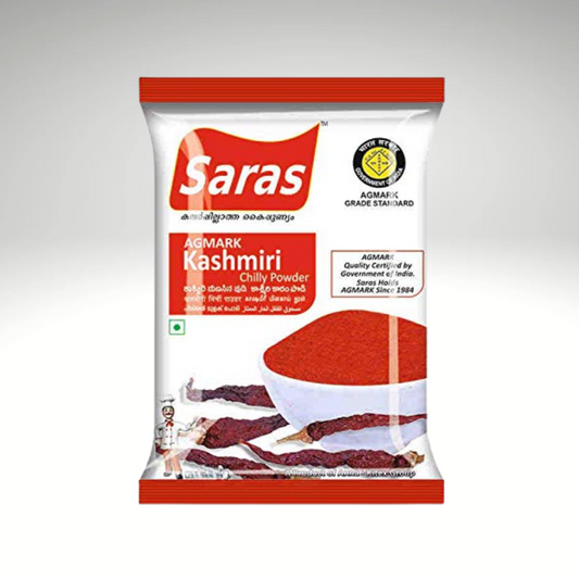 Saras Kashmiri chili powder, bright red and finely ground, known for its rich colour and mild heat, perfect for adding flavour and depth to various dishes.