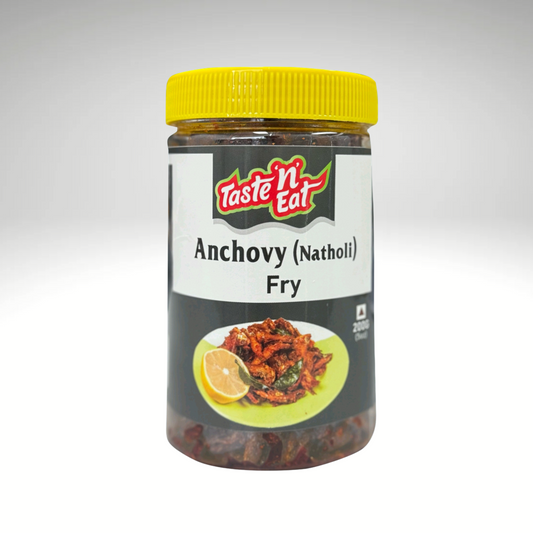 Taste 'n Eat crispy fried anchovy (natholi) coated in flavorful South Indian spices, a perfect seafood delicacy.