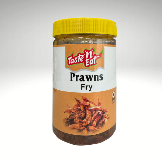 Taste 'n Eat spicy fried prawns, seasoned with aromatic South Indian spices, perfect for a savoury seafood dish.