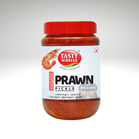 Tasty Nibbles Prawn Pickle, a vibrant jar filled with spicy and tangy prawn pickle, showcasing the rich colour and texture, perfect for adding flavour to meals.