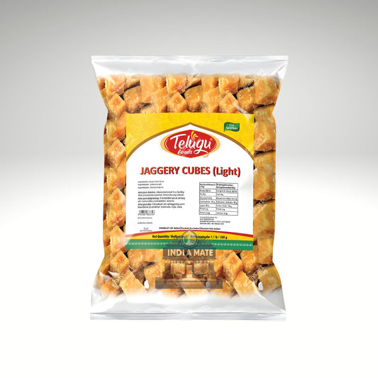 Packaged jaggery cubes with Telugu Rasam brand label on a white background.